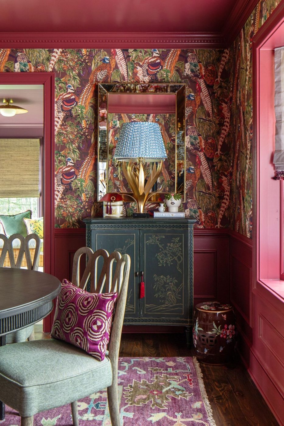 Hallway with wallcovering and raspberry trim