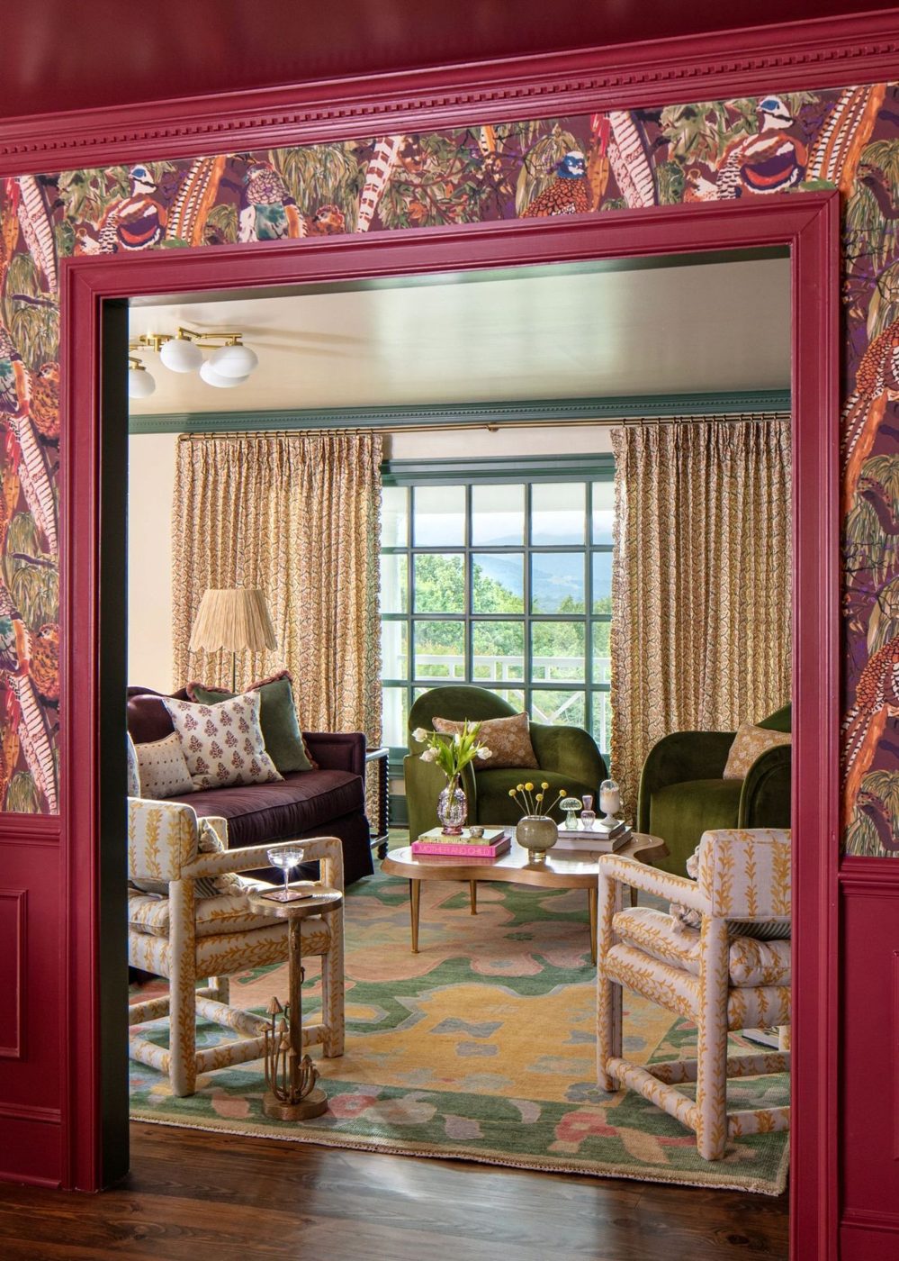 Raspberry cased opening into a painted living room